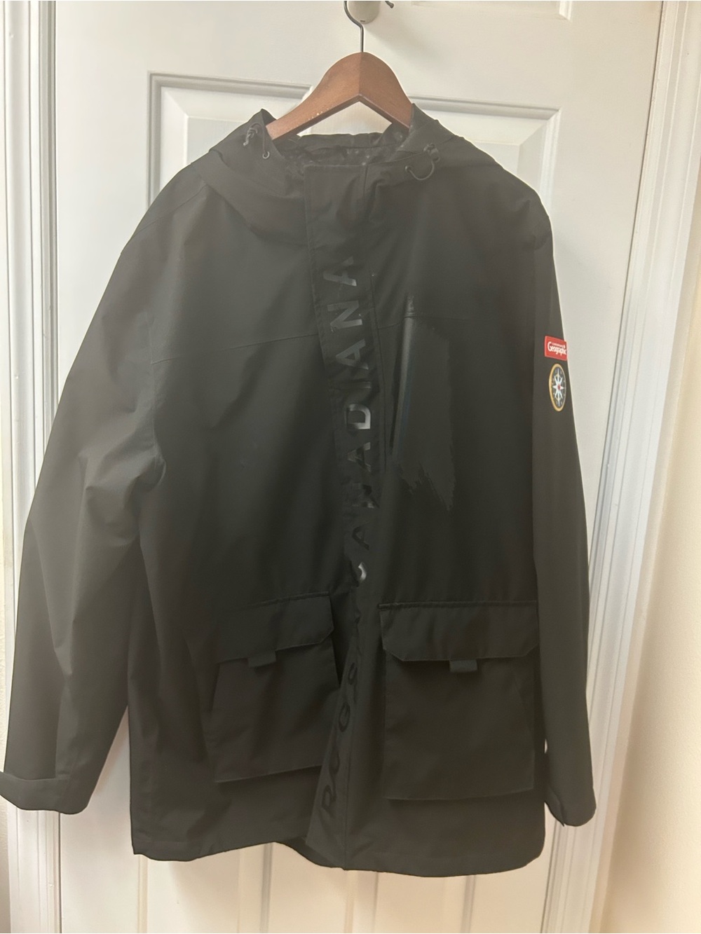 Black hooded raincoat for men or women